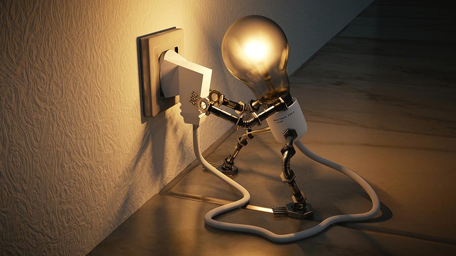 a lightbulb plugging itself into an electrical socket
